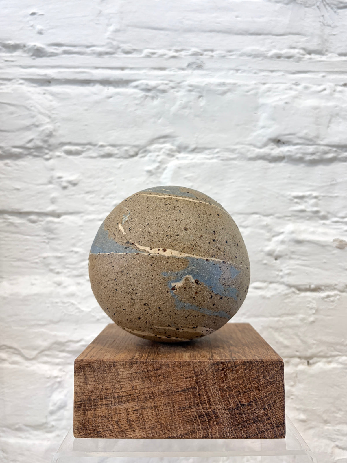 Form on wooden base