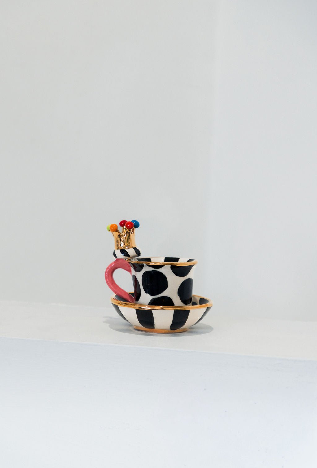 Crown Handled Demi Tasse & Saucer (Big Black Dot) - Mary - Rose Young - Beside The Wave