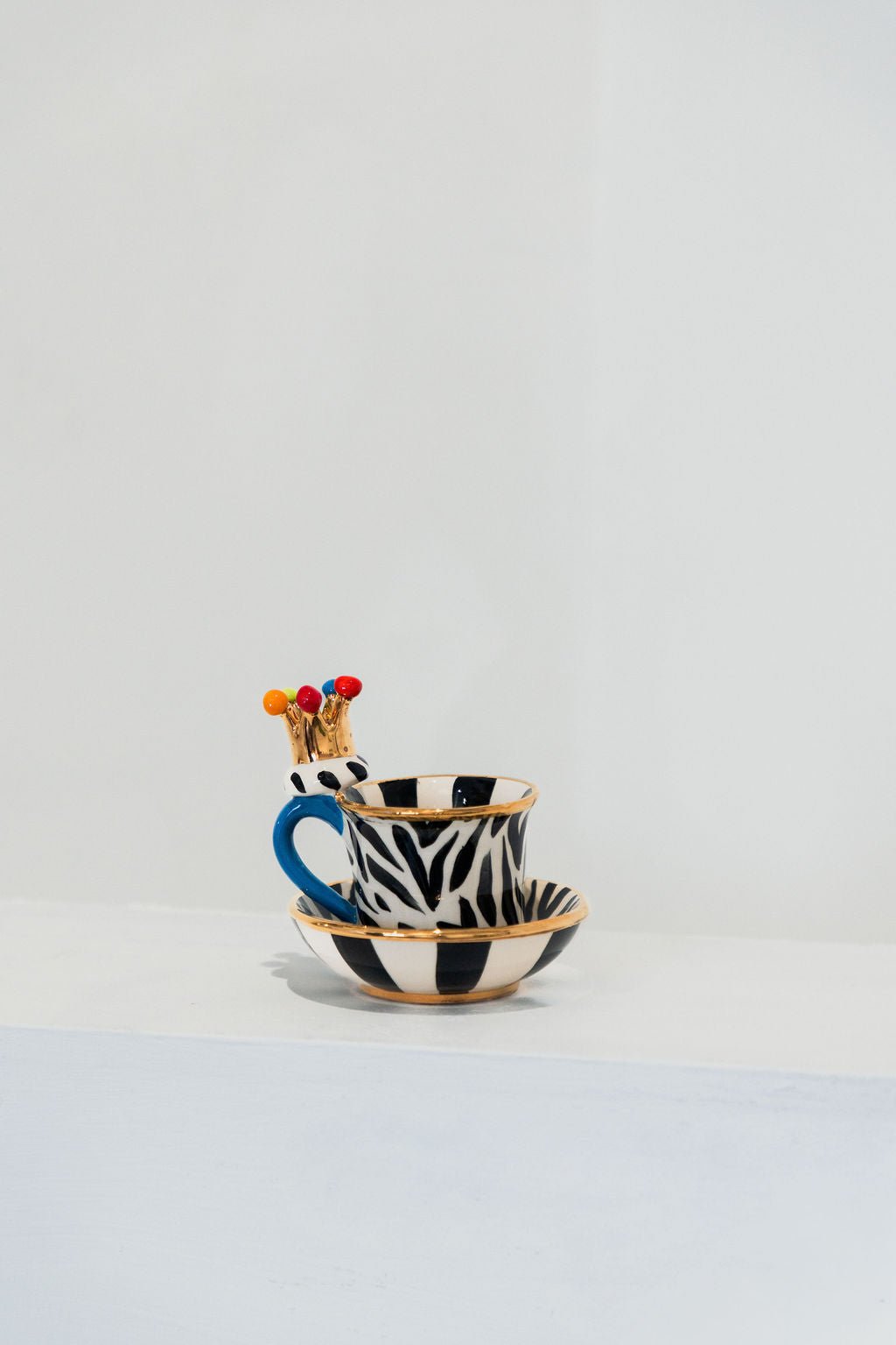 Crown Handled Demi Tasse & Saucer (Zebra) - Mary - Rose Young - Beside The Wave