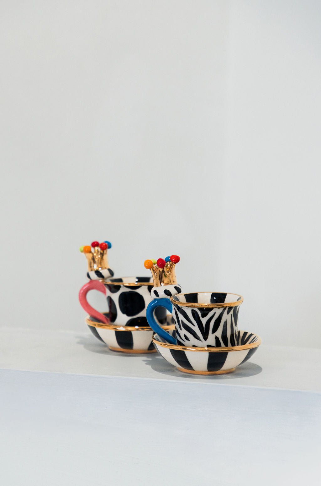 Crown Handled Demi Tasse & Saucer (Zebra) - Mary - Rose Young - Beside The Wave